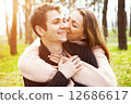 young couple in love outdoors on a sunny day 12686617
