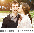 young couple in love outdoors on a sunny day 12686633
