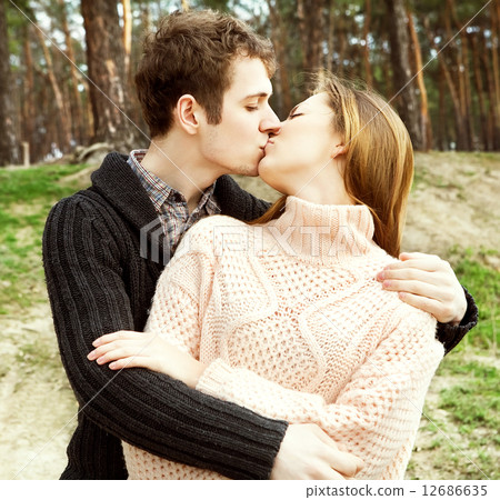 young couple in love outdoors on a sunny day young couple in love outdoors on a sunny day 12686635