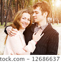 young couple in love outdoors on a sunny day 12686637
