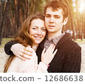young couple in love outdoors on a sunny day 12686638