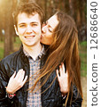 young couple in love outdoors on a sunny day 12686640