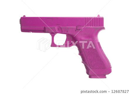 Dirty pink training gun isolated on white 12687827