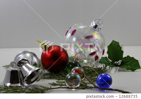Christmas Ornament and glass marble on leafs Christmas Ornament and glass marble on leafs 12688735