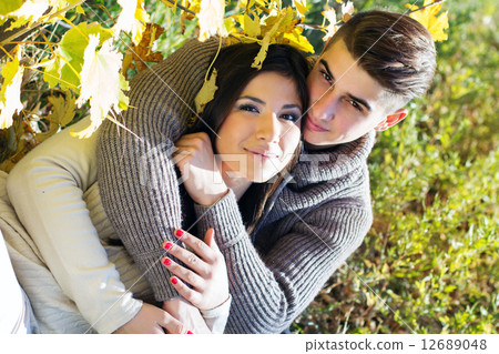 Young happy couple in the  park 12689048