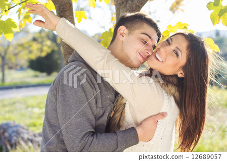 Young happy couple in the  park 12689057