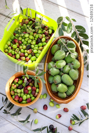 Harvest of Feijoa and olives grown in the garden 12689158