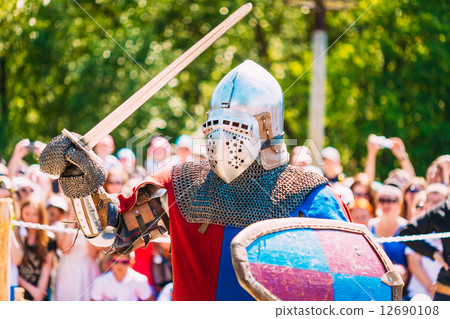 Stock Photo: Knight In Fight With Sword. Restoration Of Knightly Battle