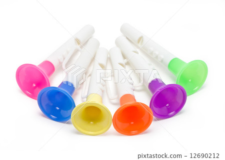 Children horn made of colored plastic isolated on white background.  12690212