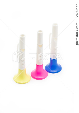 Children horn made of colored plastic isolated on white backgrou 12690336