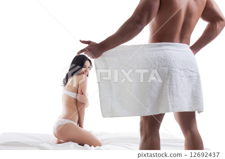 Pretty girl licking while looking at man undresses 12692437