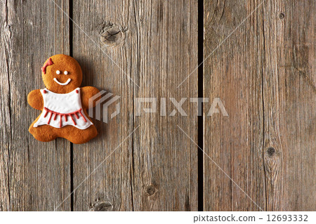 Christmas homemade gingerbread girl cookie 12693332
