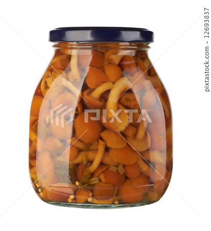 Glass jar with pickled mushrooms Glass jar with pickled mushrooms 12693837