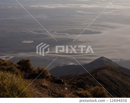 View of the Death Valley from the top of the mountain View of the Death Valley from the top of the mountain 12694838