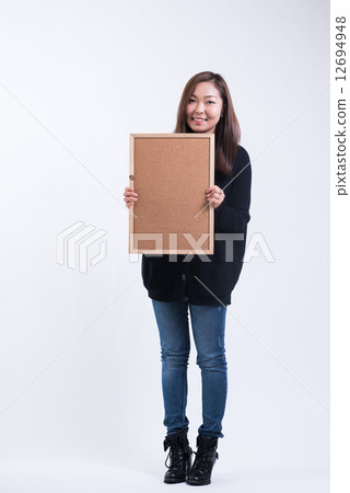 Bulletin board and a smiling woman Bulletin board and a smiling woman 12694948