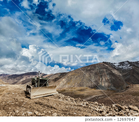 Bulldozer on road in Himalayas Bulldozer on road in Himalayas 12697647