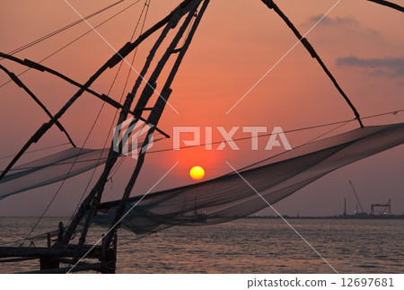 Chinese fishnets on sunset. Kochi, Kerala, India Chinese fishnets on sunset. Kochi, Kerala, India 12697681