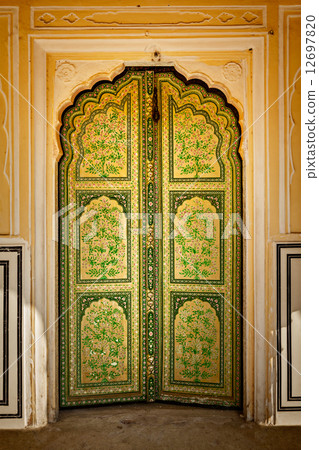 Wooden old ornamented door vintage background 12697820