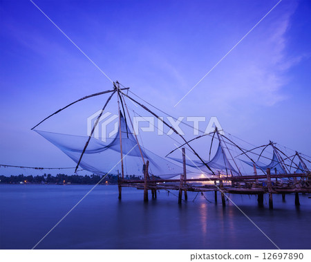 Chinese fishnets on sunset. Kochi, Kerala, India Chinese fishnets on sunset. Kochi, Kerala, India 12697890