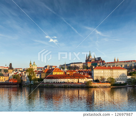 View Gradchany (Prague Castle) and St. Vitus Cathedral over Vlta 12697987