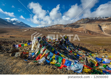 Buddhist prayer flags (lungta) on Baralacha La pass in Himalayas Buddhist prayer flags (lungta) on Baralacha La pass in Himalayas 12698060