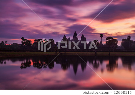 Angkor Wat - famous Cambodian landmark - on sunrise Angkor Wat - famous Cambodian landmark - on sunrise 12698115