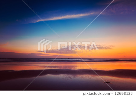 Sunset on Baga beach. Goa 12698123