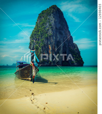 Long tail boat on beach, Thailand 12698403