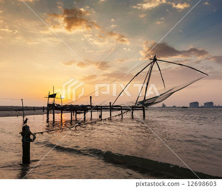 Chinese fishnets on sunset. Kochi, Kerala, India 12698603