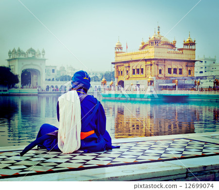Unidentifiable Seekh Nihang warrior meditating at Sikh temple Ha 12699074