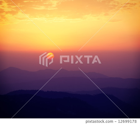 Sunset in hills 12699178