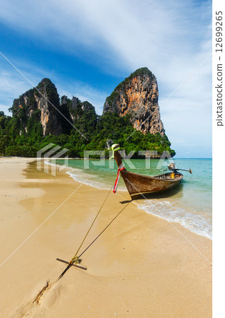 Long tail boat on beach, Thailand 12699265