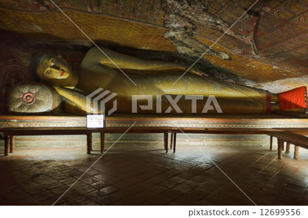 Ancient Buddha image in Dambulla Rock Temple caves, Sri Lanka 12699556