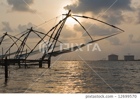 Chinese fishnets on sunset. Kochi, Kerala, India 12699570