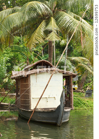 Houseboat on Kerala backwaters, India Houseboat on Kerala backwaters, India 12699753