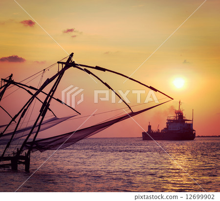 Chinese fishnets on sunset. Kochi, Kerala, India Chinese fishnets on sunset. Kochi, Kerala, India 12699902