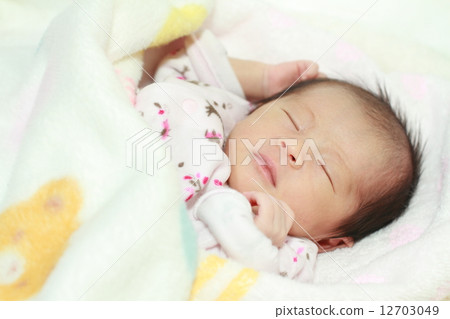 A baby's sleeping face of 1 month old baby A baby's sleeping face of 1 month old baby 12703049