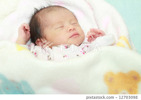 A baby's sleeping face of 1 month old baby A baby's sleeping face of 1 month old baby 12703098
