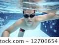 Underwater picture of a man swimming 12706654