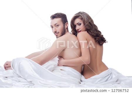 Two sexual partner posing naked in bed 12706752