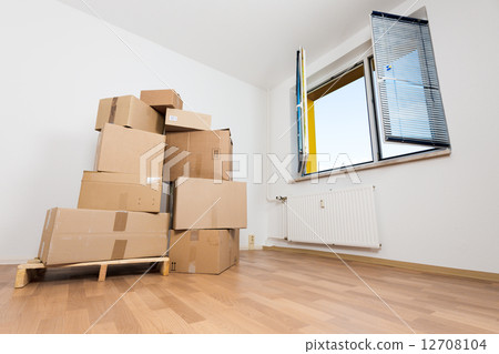 cardboard boxes in an empty apartment. moving to a new apartment cardboard boxes in an empty apartment. moving to a new apartment 12708104
