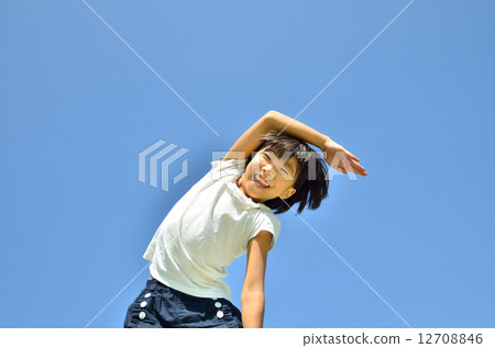 Girls exercising in the blue sky 12708846