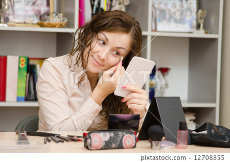 girl at work gets in the shadows on face 12708855