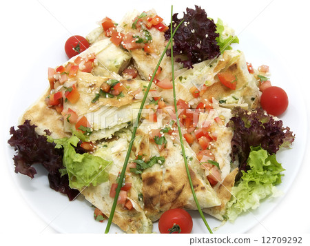 pita bread with vegetables on a plate in a restaurant 12709292