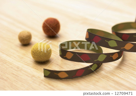 Felt ball and ribbon Felt ball and ribbon 12709471