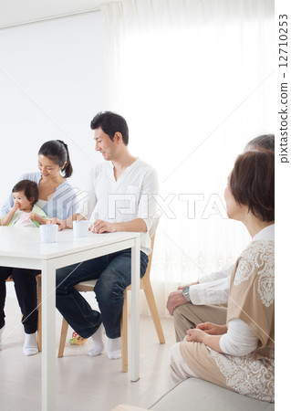 Three generations family image playing with children 12710253