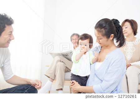 Three generations family image playing with children Three generations family image playing with children 12710261