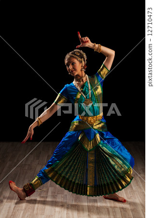 Beautiful girl dancer of Indian classical dance Bharatanatyam 12710473