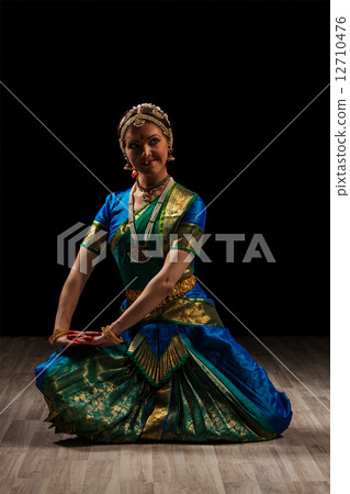 Beautiful girl dancer of Indian classical dance Bharatanatyam 12710476