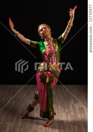 Beautiful girl dancer of Indian classical dance Bharatanatyam 12710477